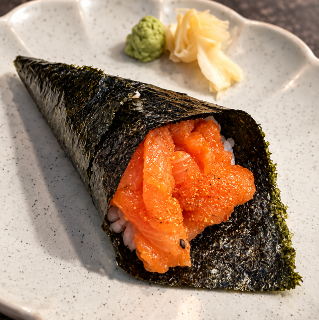 Spicy salmon hand roll.